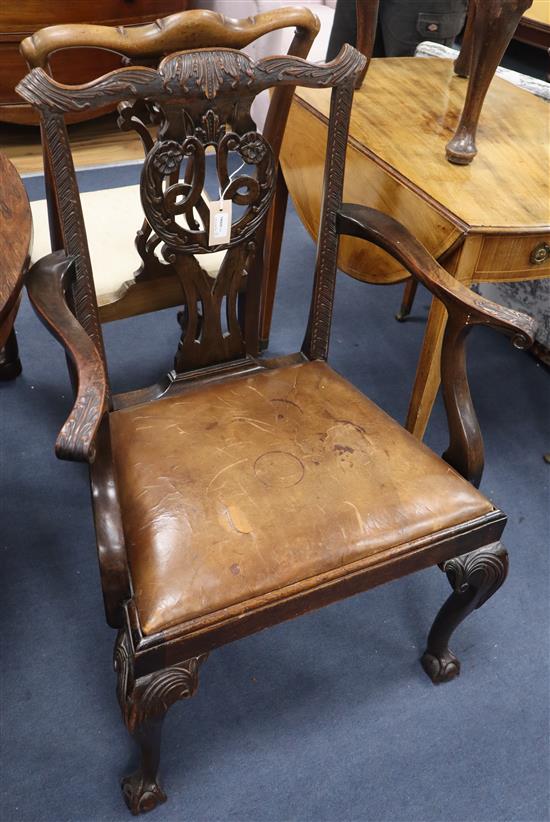 A set of three Chippendale style mahogany side chairs, a similar chair and an open armchair (5)